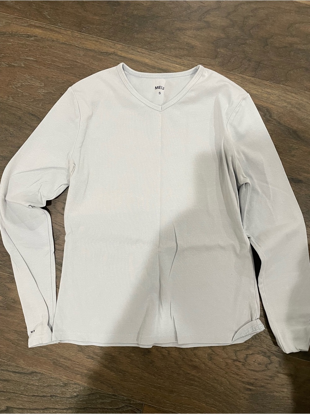 Women's Meli by Fame Long-Sleeve V-Neck Top in Light blue